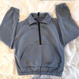 Blue half-zip sweatshirt